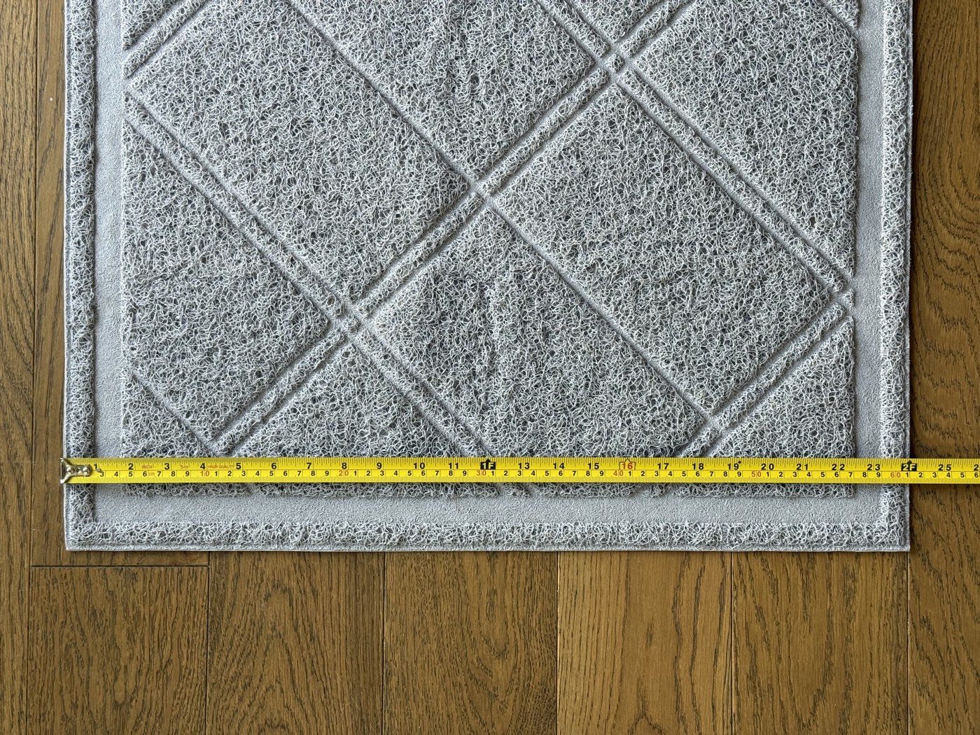 Tape measure across the short edge, about 24 inches